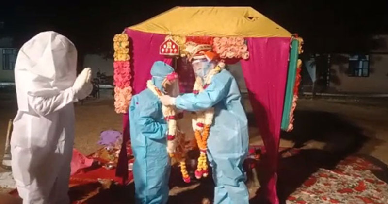 Couple Gets Married In PPE Kits