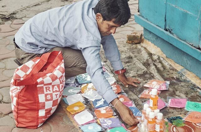 man selling mask to send her daughter to school